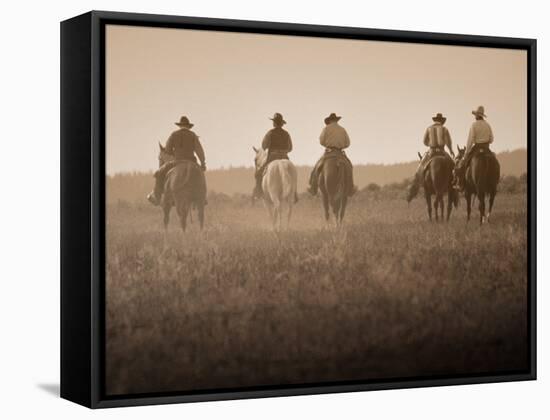 Sepia Effect of Cowboys Riding, Seneca, Oregon, USA-Nancy & Steve Ross-Framed Stretched Canvas