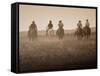 Sepia Effect of Cowboys Riding, Seneca, Oregon, USA-Nancy & Steve Ross-Framed Stretched Canvas