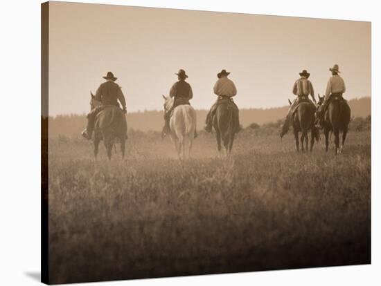 Sepia Effect of Cowboys Riding, Seneca, Oregon, USA-Nancy & Steve Ross-Stretched Canvas