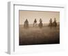 Sepia Effect of Cowboys Riding, Seneca, Oregon, USA-Nancy & Steve Ross-Framed Photographic Print