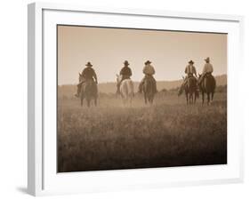 Sepia Effect of Cowboys Riding, Seneca, Oregon, USA-Nancy & Steve Ross-Framed Photographic Print