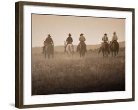 Sepia Effect of Cowboys Riding, Seneca, Oregon, USA-Nancy & Steve Ross-Framed Photographic Print