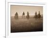 Sepia Effect of Cowboys Riding, Seneca, Oregon, USA-Nancy & Steve Ross-Framed Photographic Print