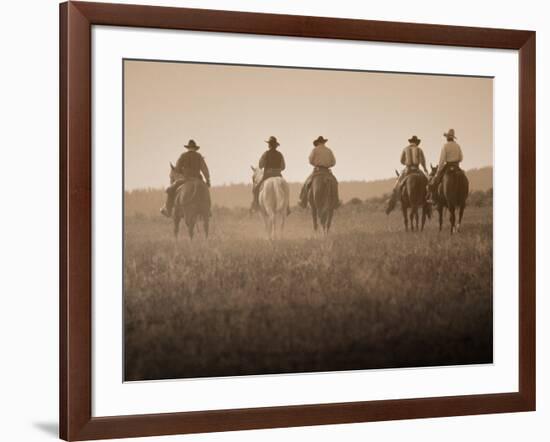 Sepia Effect of Cowboys Riding, Seneca, Oregon, USA-Nancy & Steve Ross-Framed Photographic Print