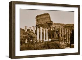 Sepia image of columns of the Forum and Colosseum or Roman Coliseum at dusk with streaked car li...-null-Framed Photographic Print