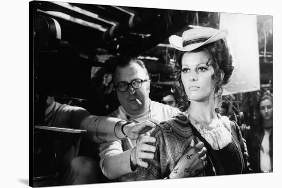 Sergio Leone (1929 - 1989) and Claudia Cardinale during the shooting of Once Upon a Time in the Wes-null-Stretched Canvas