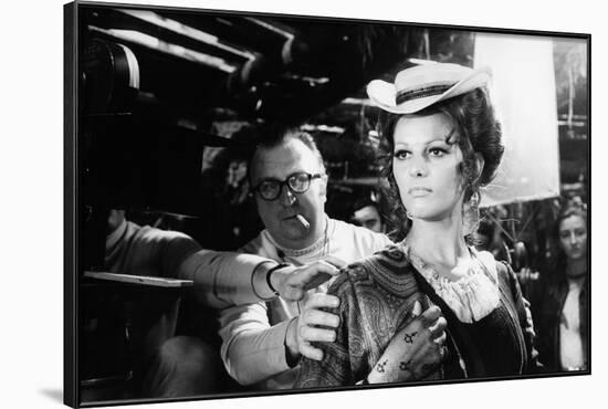 Sergio Leone (1929 - 1989) and Claudia Cardinale during the shooting of Once Upon a Time in the Wes-null-Framed Photo