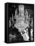 Servants of British Lord Archibald Wavell cleaning Crystal Chandelier in Opulent Palace-Margaret Bourke-White-Framed Stretched Canvas