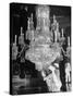 Servants of British Lord Archibald Wavell cleaning Crystal Chandelier in Opulent Palace-Margaret Bourke-White-Stretched Canvas