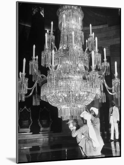 Servants of British Lord Archibald Wavell cleaning Crystal Chandelier in Opulent Palace-Margaret Bourke-White-Mounted Photographic Print