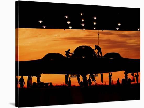 Service Members Undergo Maintenance on a B-2 Spirit-null-Stretched Canvas