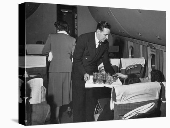 Serving Drinks, over English Channel, before Dinner, During a Transatlantic Flight-Peter Stackpole-Stretched Canvas