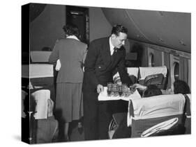Serving Drinks, over English Channel, before Dinner, During a Transatlantic Flight-Peter Stackpole-Stretched Canvas