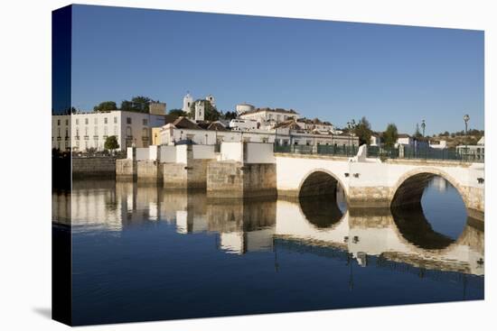 Seven arched Roman bridge and town on the Rio Gilao river, Tavira, Algarve, Portugal, Europe-Stuart Black-Stretched Canvas