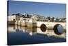 Seven arched Roman bridge and town on the Rio Gilao river, Tavira, Algarve, Portugal, Europe-Stuart Black-Stretched Canvas