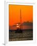 Seven Mile Beach, Grand Cayman. Sailboat on the Carribean at sunset.-Jolly Sienda-Framed Photographic Print