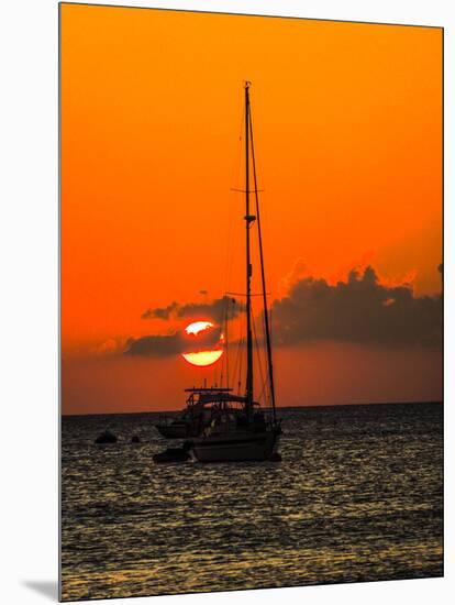 Seven Mile Beach, Grand Cayman. Sailboat on the Carribean at sunset.-Jolly Sienda-Mounted Photographic Print