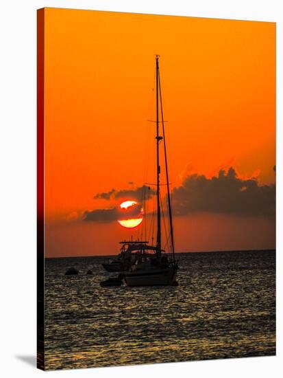 Seven Mile Beach, Grand Cayman. Sailboat on the Carribean at sunset.-Jolly Sienda-Stretched Canvas