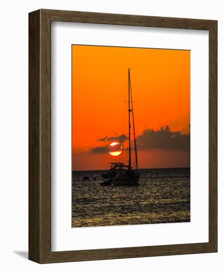 Seven Mile Beach, Grand Cayman. Sailboat on the Carribean at sunset.-Jolly Sienda-Framed Photographic Print