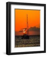 Seven Mile Beach, Grand Cayman. Sailboat on the Carribean at sunset.-Jolly Sienda-Framed Photographic Print