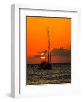 Seven Mile Beach, Grand Cayman. Sailboat on the Carribean at sunset.-Jolly Sienda-Framed Photographic Print