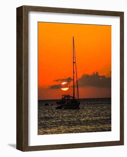 Seven Mile Beach, Grand Cayman. Sailboat on the Carribean at sunset.-Jolly Sienda-Framed Photographic Print