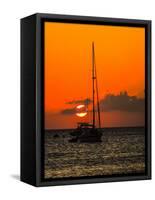 Seven Mile Beach, Grand Cayman. Sailboat on the Carribean at sunset.-Jolly Sienda-Framed Stretched Canvas