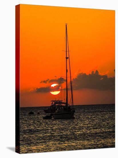 Seven Mile Beach, Grand Cayman. Sailboat on the Carribean at sunset.-Jolly Sienda-Stretched Canvas