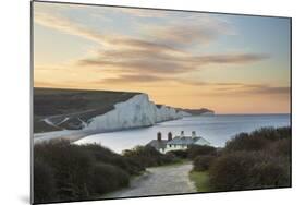Seven Sisters and Beachy Head with coastguard cottages at sunrise in spring, Seaford Head-Stuart Black-Mounted Photographic Print