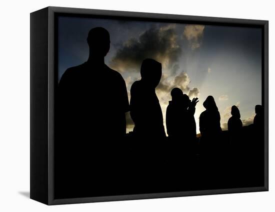 Several Africans Immigrants Chat at Sunset Outside of the Holding Centre for Immigrants-null-Framed Stretched Canvas