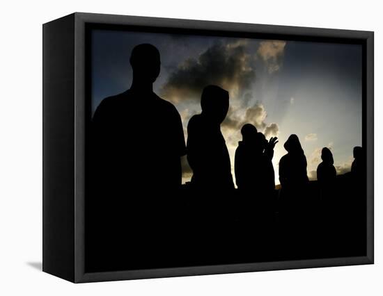 Several Africans Immigrants Chat at Sunset Outside of the Holding Centre for Immigrants-null-Framed Stretched Canvas