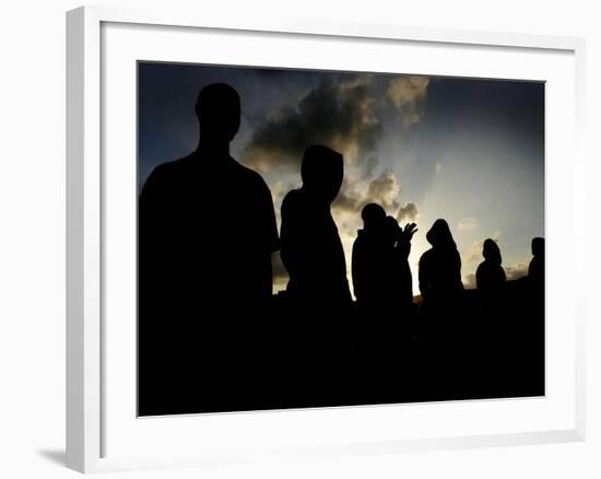 Several Africans Immigrants Chat at Sunset Outside of the Holding Centre for Immigrants-null-Framed Photographic Print