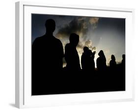 Several Africans Immigrants Chat at Sunset Outside of the Holding Centre for Immigrants-null-Framed Photographic Print