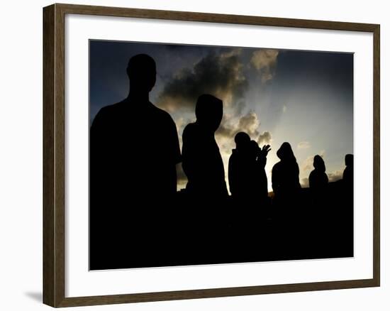 Several Africans Immigrants Chat at Sunset Outside of the Holding Centre for Immigrants-null-Framed Photographic Print