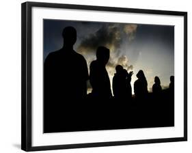 Several Africans Immigrants Chat at Sunset Outside of the Holding Centre for Immigrants-null-Framed Photographic Print