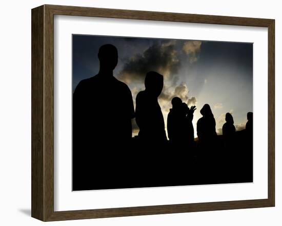 Several Africans Immigrants Chat at Sunset Outside of the Holding Centre for Immigrants-null-Framed Photographic Print