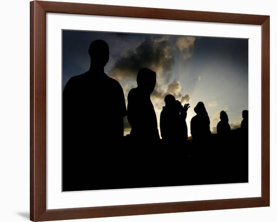 Several Africans Immigrants Chat at Sunset Outside of the Holding Centre for Immigrants-null-Framed Photographic Print