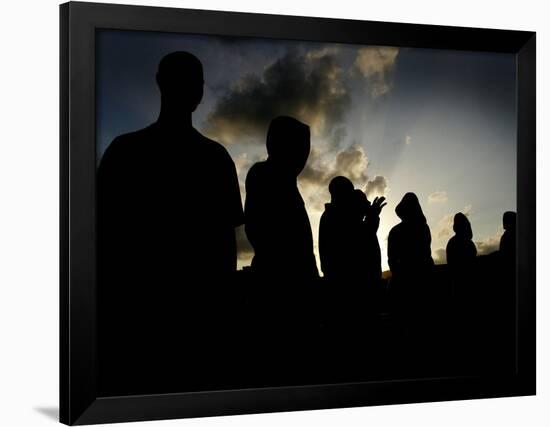 Several Africans Immigrants Chat at Sunset Outside of the Holding Centre for Immigrants-null-Framed Photographic Print