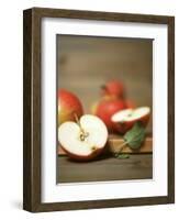 Several Apples, One Halved-Uwe Bender-Framed Photographic Print