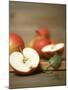 Several Apples, One Halved-Uwe Bender-Mounted Photographic Print