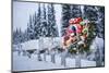 Several Mailboxes Lined Up In A Row With One Decorated With A Christmas Wreath During Winter-Design Pics-Mounted Photographic Print