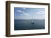 Several Sailboats Floating in the Ocean with Mountains and Clouds in the Background-Wirestock-Framed Photographic Print