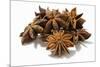 Several Star Anise on White Background-Kröger and Gross-Mounted Photographic Print