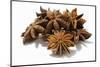 Several Star Anise on White Background-Kröger and Gross-Mounted Photographic Print