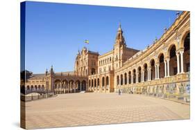 Seville Plaza de Espana with ceramic tiled alcoves and arches, Maria Luisa Park, Seville, Spain-Neale Clark-Stretched Canvas