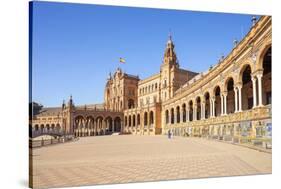 Seville Plaza de Espana with ceramic tiled alcoves and arches, Maria Luisa Park, Seville, Spain-Neale Clark-Stretched Canvas