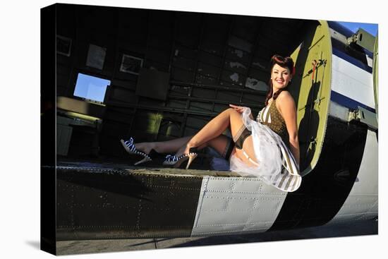 Sexy 1940's Style Pin-Up Girl Sitting Inside of a C-47 Skytrain Aircraft-null-Stretched Canvas