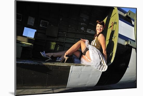 Sexy 1940's Style Pin-Up Girl Sitting Inside of a C-47 Skytrain Aircraft-null-Mounted Photographic Print