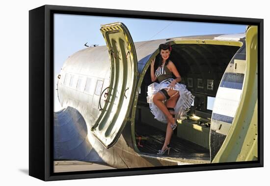 Sexy 1940's Style Pin-Up Girl Standing Inside of a C-47 Skytrain Aircraft-null-Framed Stretched Canvas