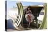 Sexy 1940's Style Pin-Up Girl Standing Inside of a C-47 Skytrain Aircraft-null-Stretched Canvas